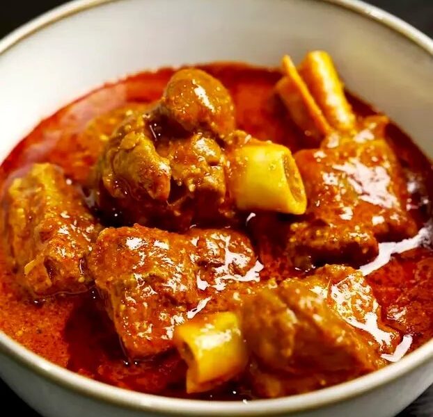 Lamb bhuna in a rich tomato and onion sauce